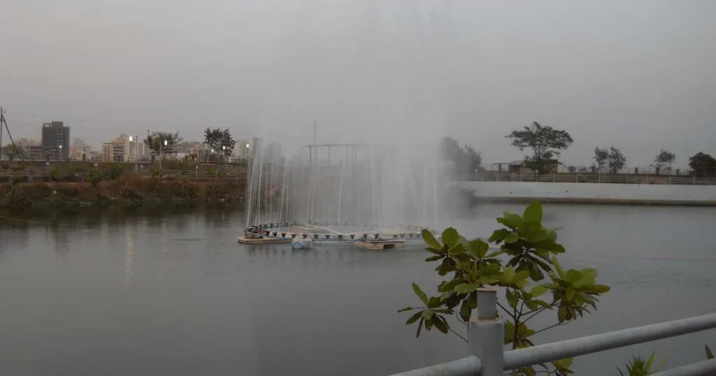 Central Park Kharghar waterfall is visible in this image.