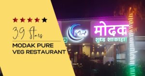 Modak Pure Veg Restaurant is visible in this image.