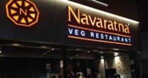 This Image About of Navaratna Veg  Restaurant.