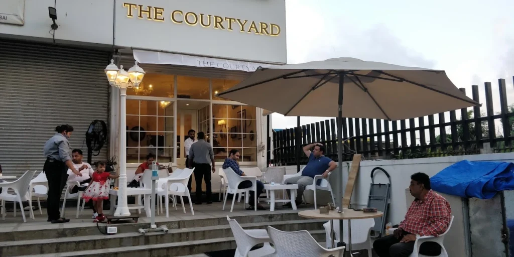 The Courtyard Cafe, Kharghar is visible in this image.