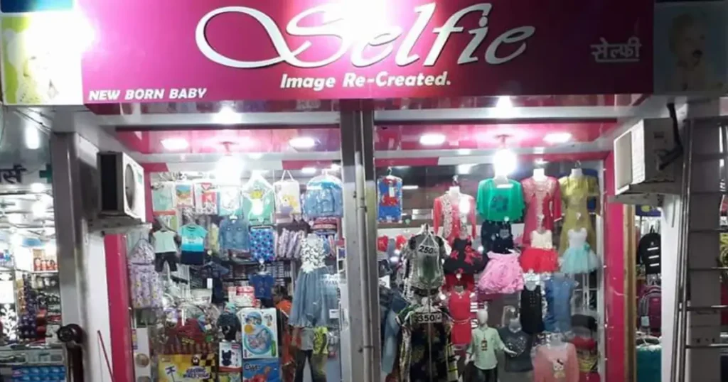 Selfie New Born & Kids Wear is visible in this image