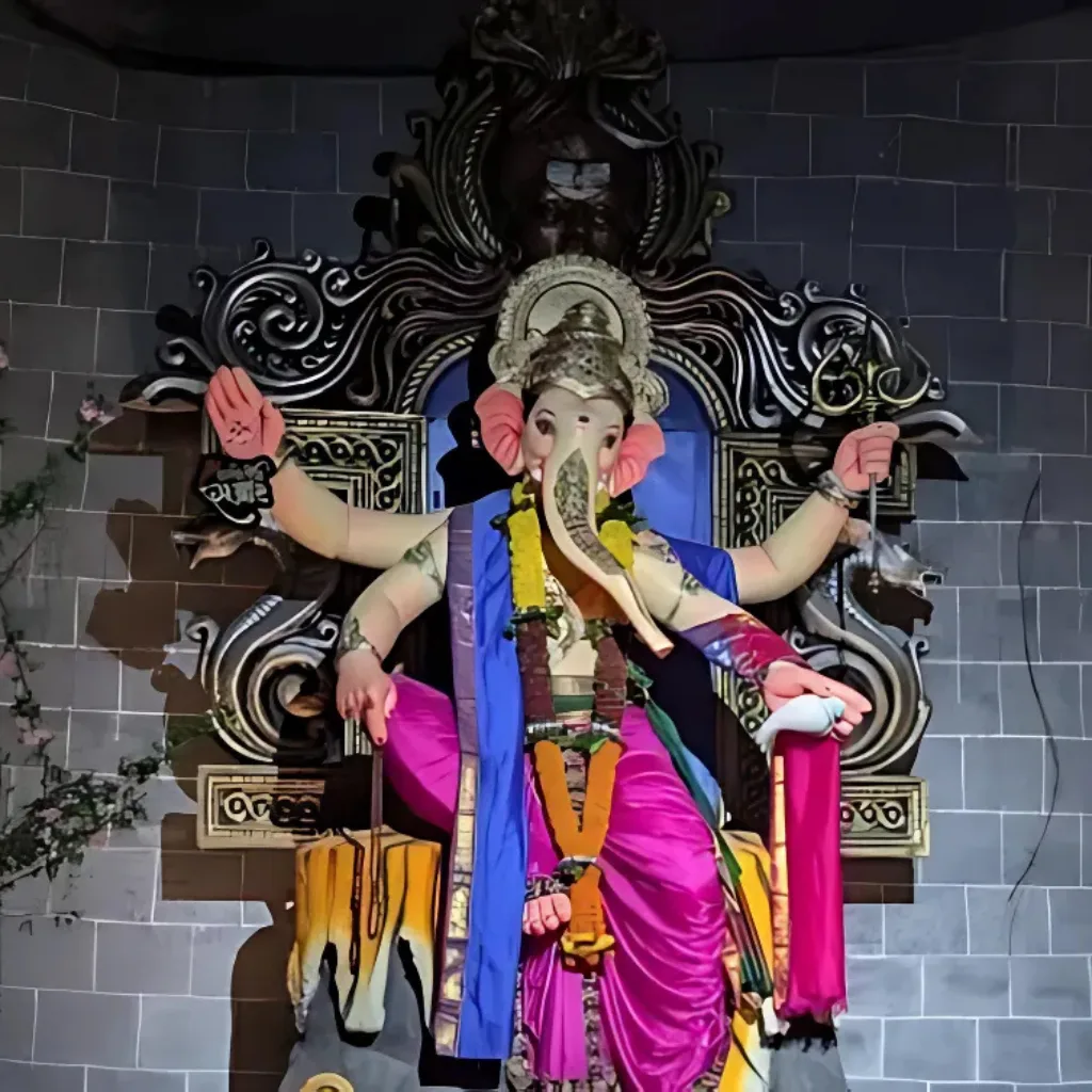 Ghansolicha Samrat Ganpati is visible in this image.