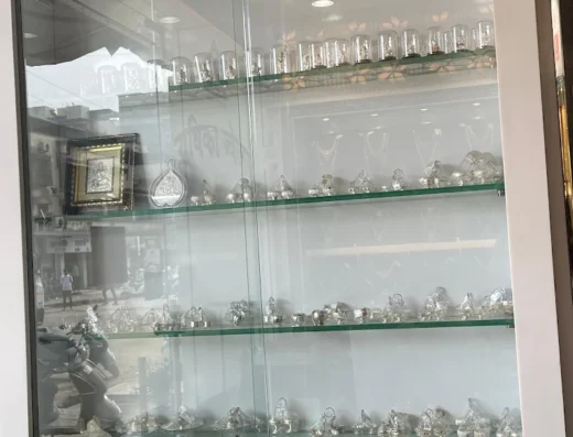 Radhika Jewellers Navi Mumbai is visible in this image.