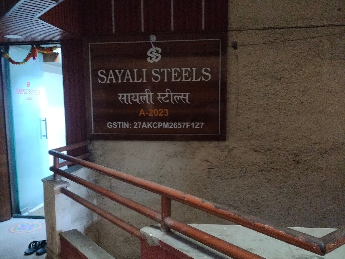 The office entrance for Sayali Steels, a member business located in the BIMA complex, showing their professional signage with GSTIN.