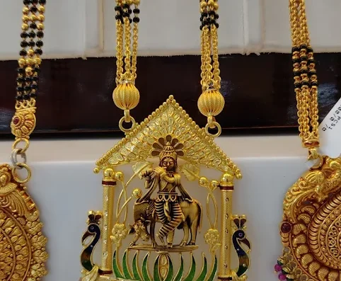 Swarnaganga Jewellers Kharghar Navi Mumbai is visible in this image.