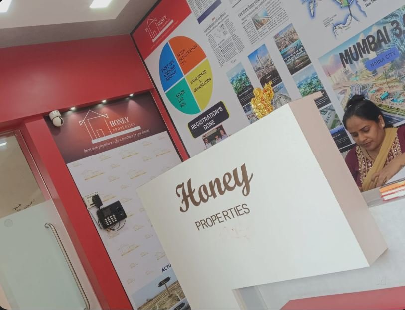 Honey Properties Belapur entrance is visible in this image