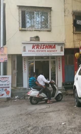 Krishna Real Estate Airoli entrance is visible in this image.
