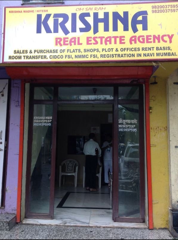 Krishna Real Estate Airoli banner and entrance is visible in this image.