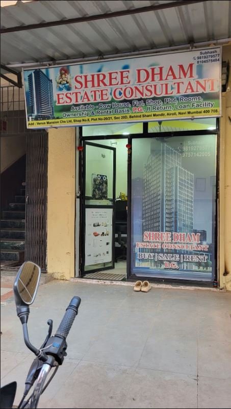 Shree Dham Estate Consultants entrance is visible in this image.
